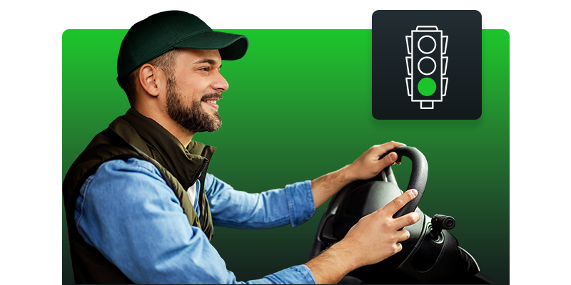 Répartiteur utilisant un ordinateur, illustrant le module Énergie de Neo Répartition, qui optimise les coûts de carburant grâce à l’analyse des données.